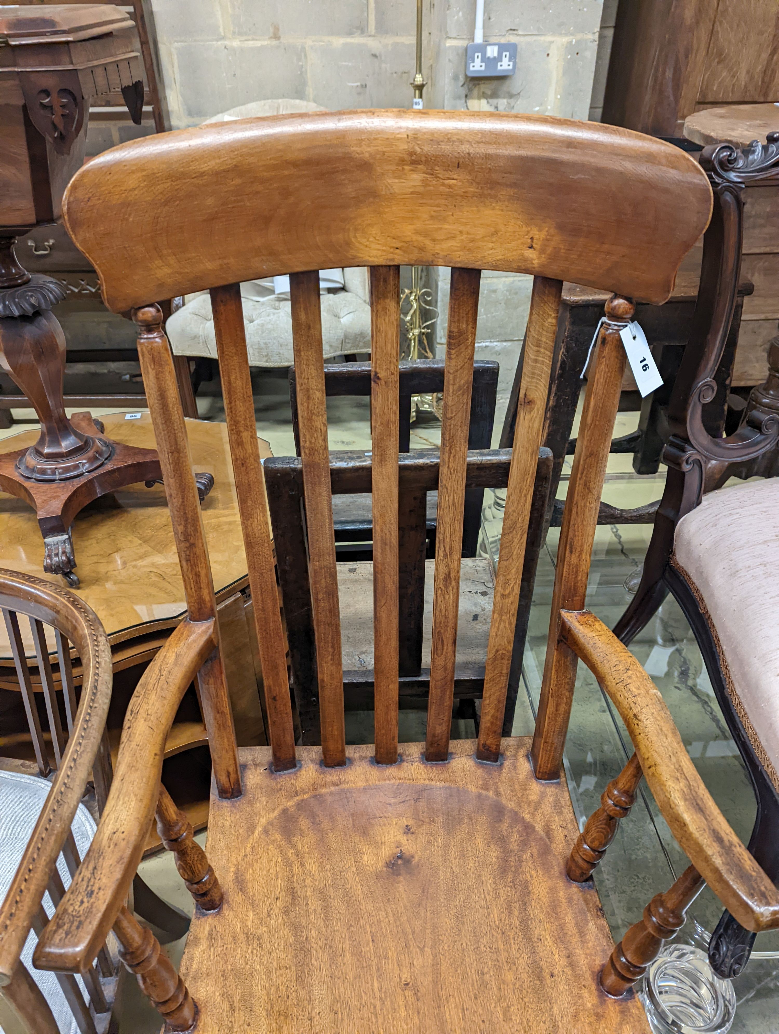 A Victorian elm and beech Windsor lathe back armchair, width 57cm, depth 45cm, height 118cm